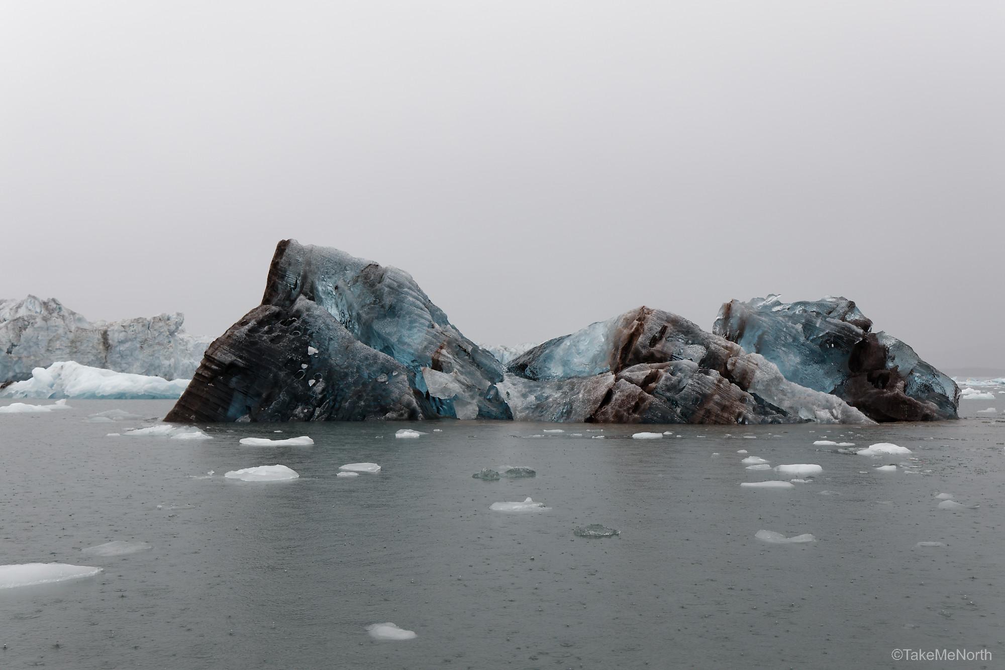 Blue ice and sediments in a recently tumbled iceberg