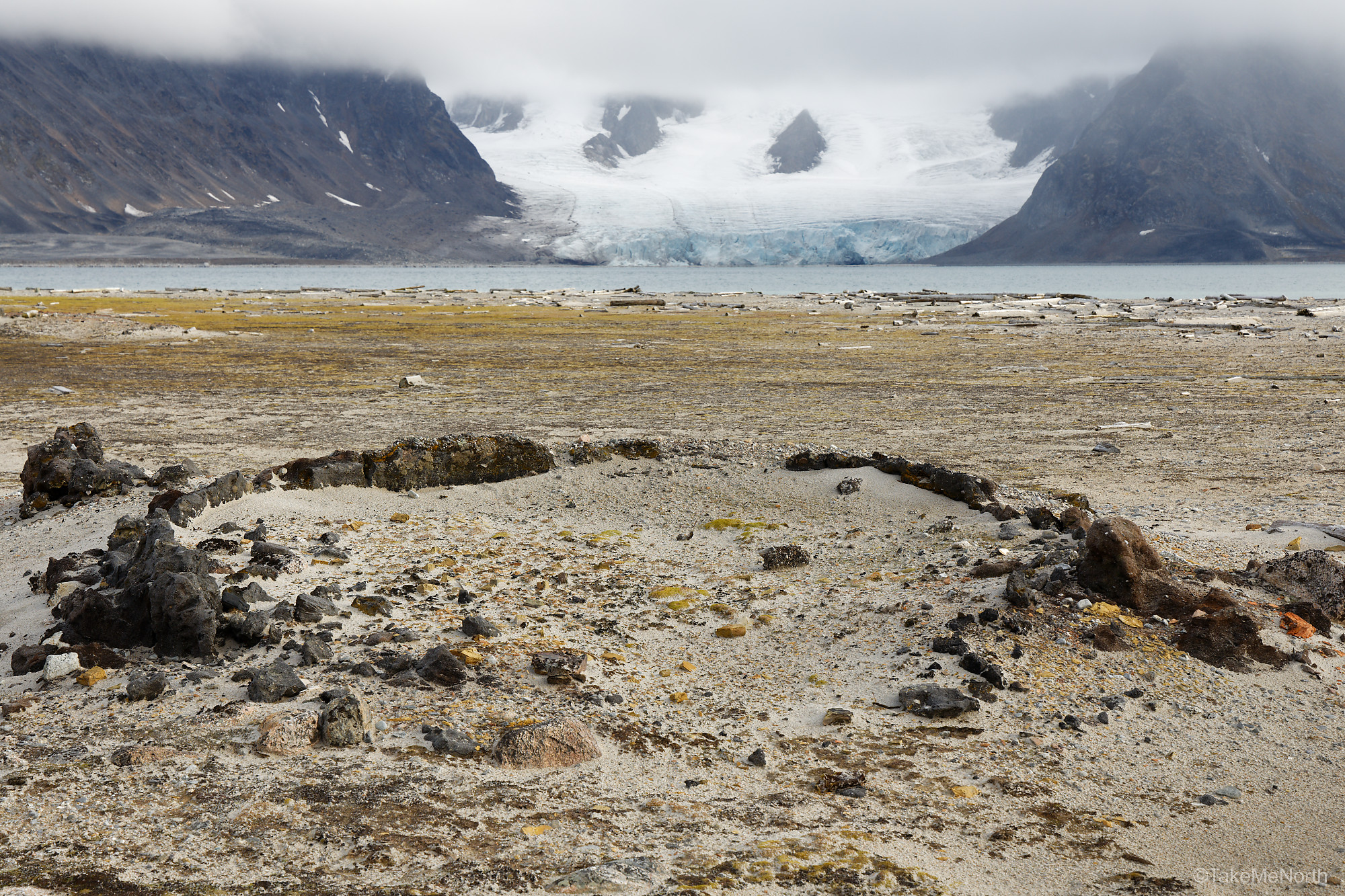 The concrete-like foundation of a blubber oven, made with a mixture of whale fat and sand.